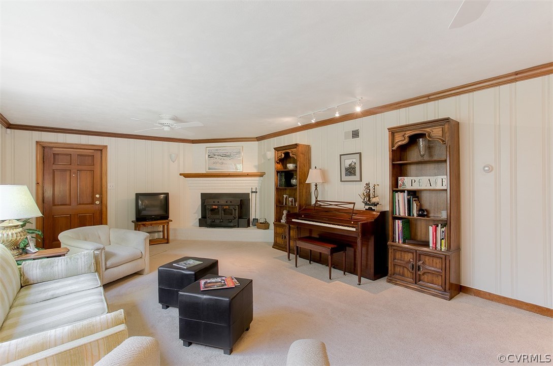 4036 Sherbrook Road Richmond, VA 23235 - Photo 27 of 41 Fireplace with wood stove insert creates a cozy ga