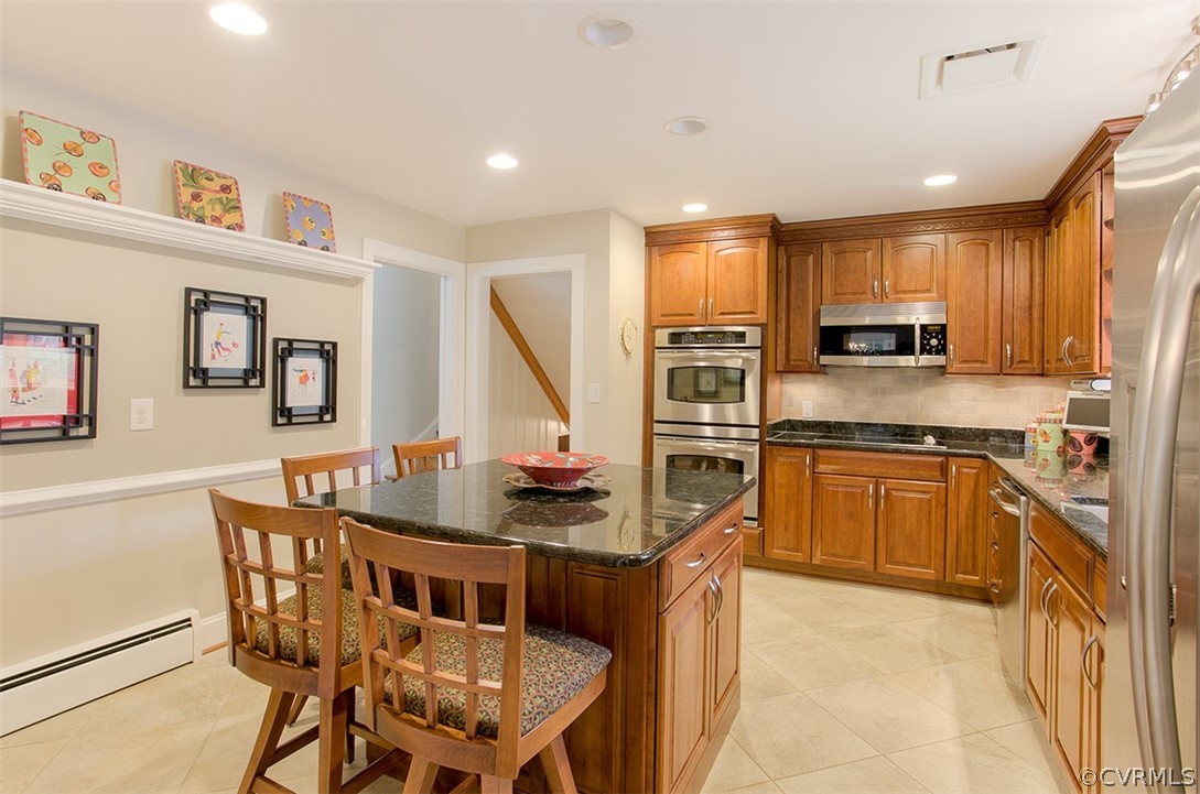 4036 Sherbrook Road Richmond, VA 23235 - Photo 9 of 41 Double ovens and large island provide lots of spac