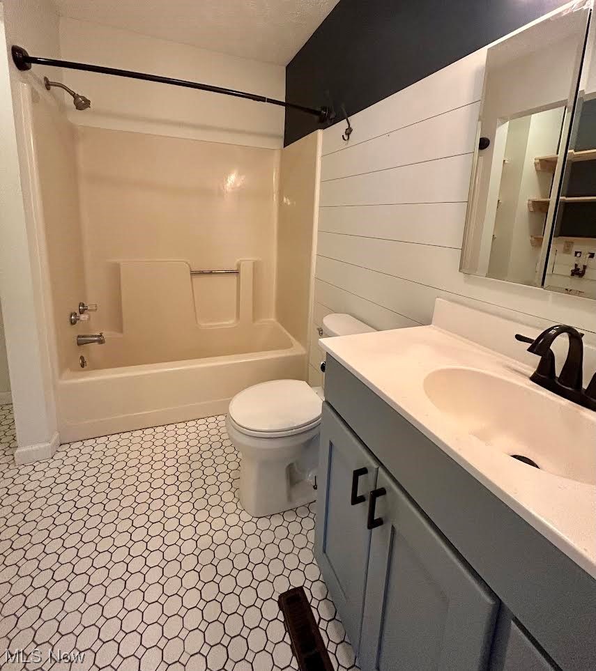 35 Chainey Run Road Marietta, OH 45750 - Photo 11 of 28 Full bathroom with vanity, mirror, tub / shower combination, and light tile floors