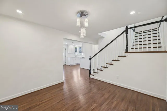 a view of entryway with wooden floor