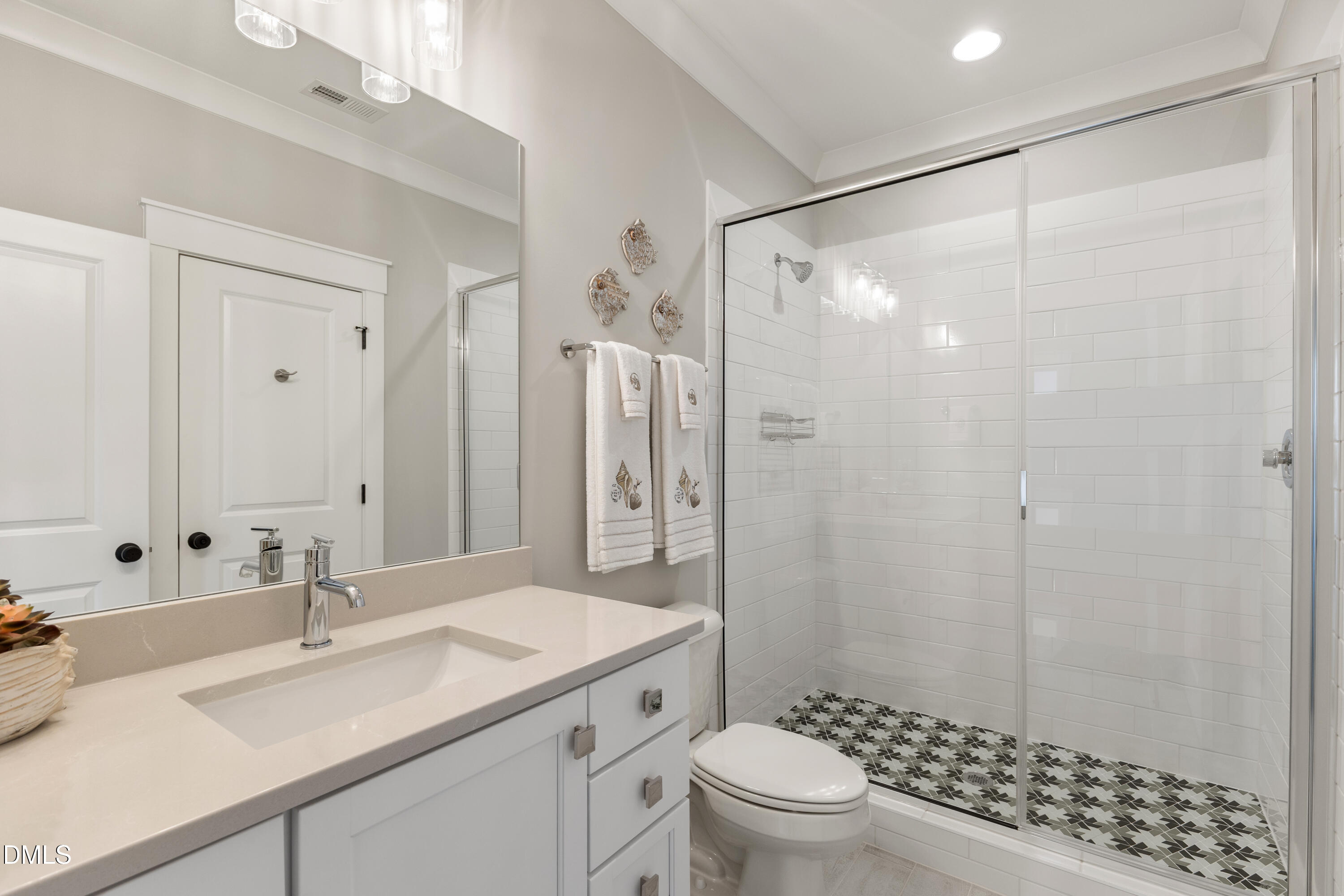 75 Cottage Way Pittsboro, NC 27312 - Photo 33 of 68 a bathroom with a sink toilet and shower