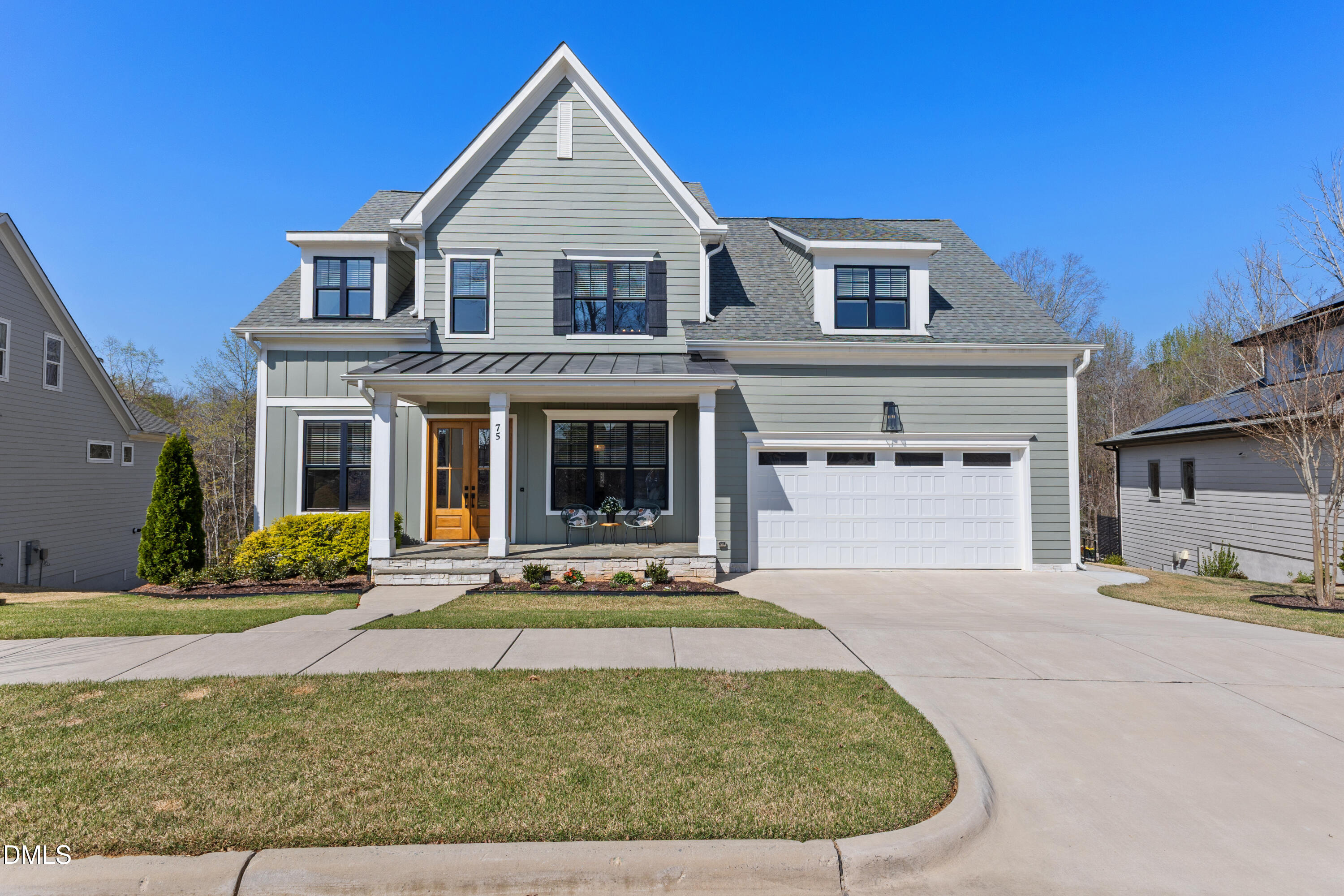 75 Cottage Way Pittsboro, NC 27312 - Photo 47 of 68 a front view of a house with garden