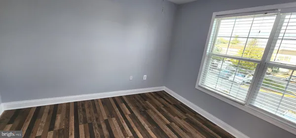 a kitchen with granite countertop a stove top oven