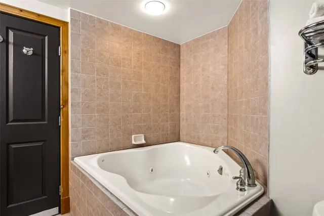a bathroom with a bathtub