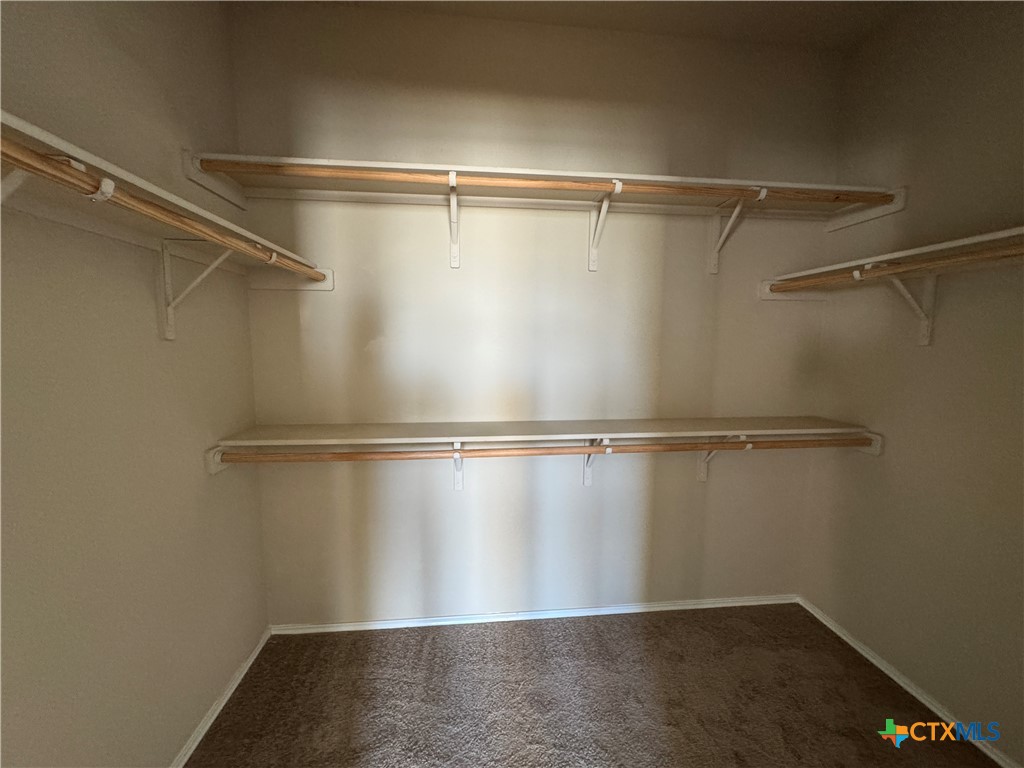 6801 Modesto Road Killeen, TX 76542 - Photo 15 of 26 a view of a room with racks on the wall