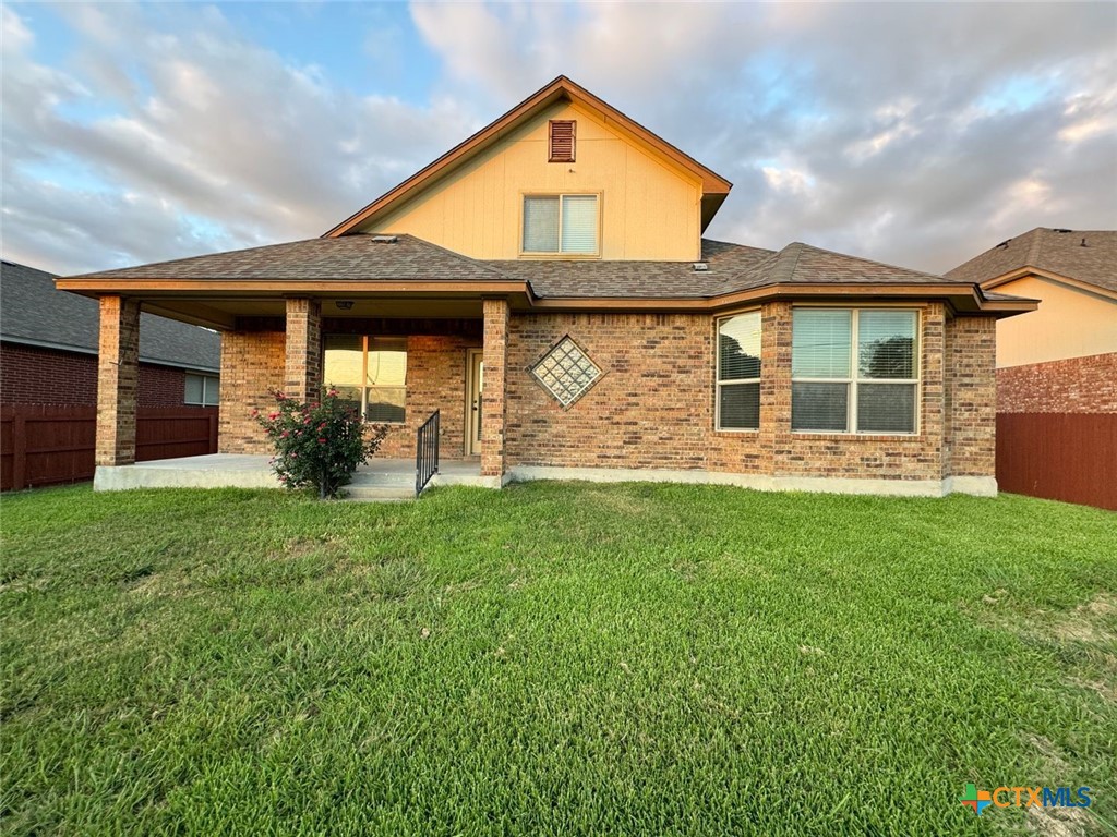 6801 Modesto Road Killeen, TX 76542 - Photo 24 of 26 front view of a house with a yard