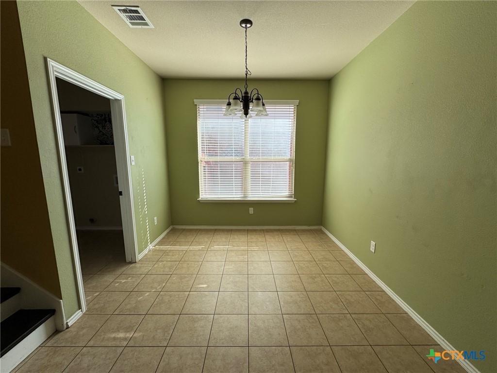 6801 Modesto Road Killeen, TX 76542 - Photo 8 of 26 a view of an empty room with a window
