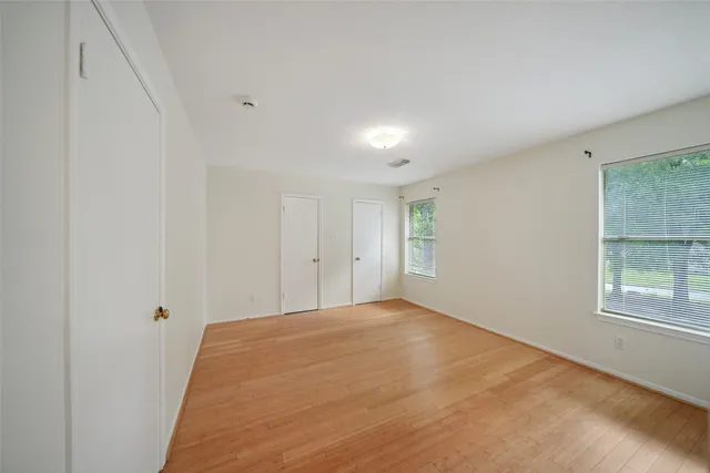 a view of a livingroom with an empty space and window