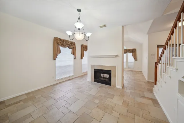 a view of a livingroom with a fireplace