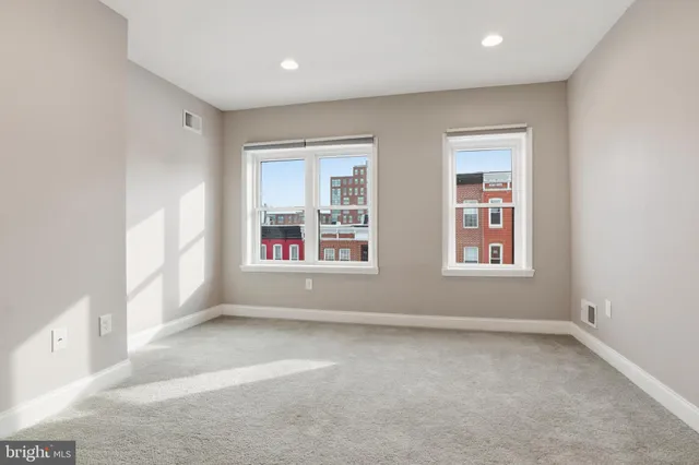 a view of a room with racks on the wall