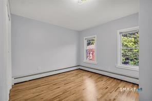 634 Newhall Street Hamden, CT 06517 - Photo 13 of 28 an empty room with a window