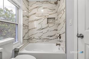 634 Newhall Street Hamden, CT 06517 - Photo 17 of 28 a bathroom with a bathtub