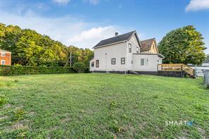 634 Newhall Street Hamden, CT 06517 - Photo 23 of 28 a view of a house with a yard