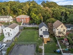 634 Newhall Street Hamden, CT 06517 - Photo 24 of 28 an aerial view of a house with swimming pool garden and patio