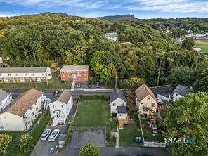 634 Newhall Street Hamden, CT 06517 - Photo 26 of 28 an aerial view of a house with a garden