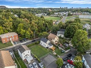 634 Newhall Street Hamden, CT 06517 - Photo 27 of 28 an aerial view of a house with a yard
