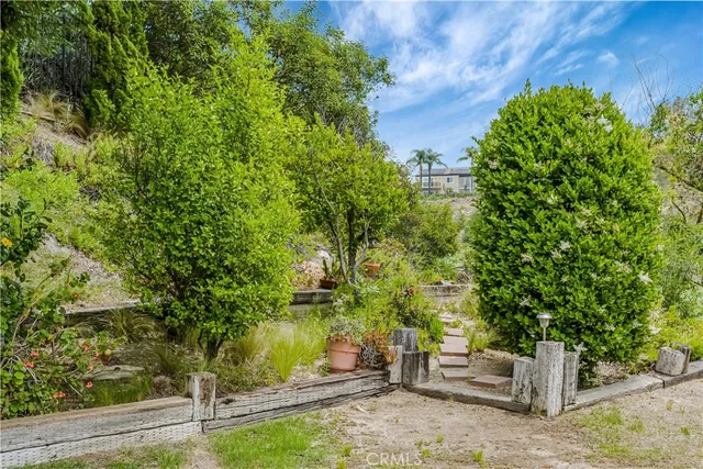 a backyard of a house with lots of green space