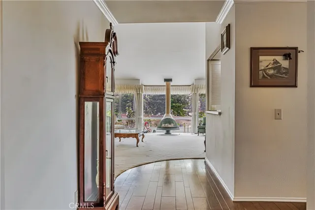 a view of a living room and a balcony