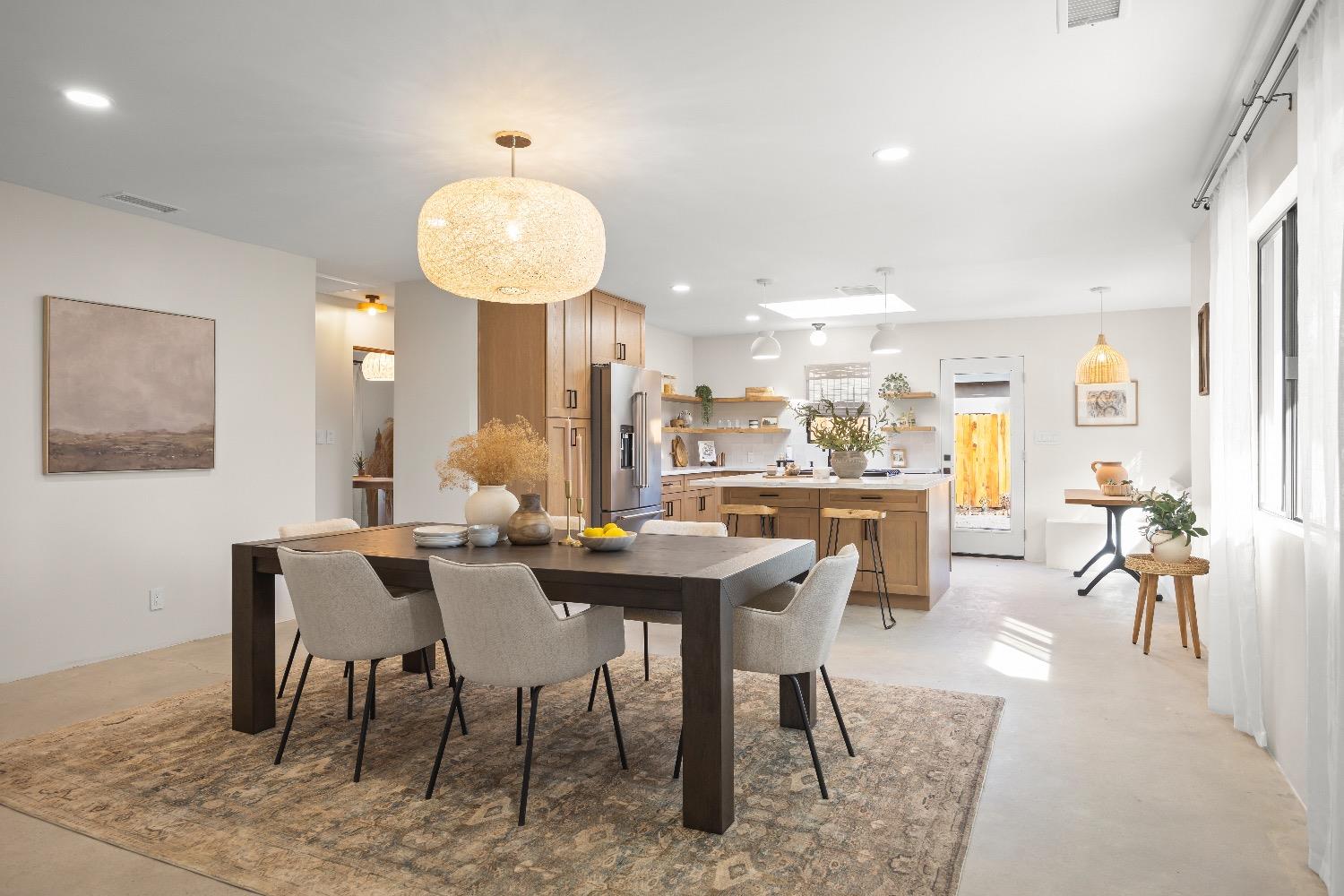 283 Burnham Road Oak View, CA 93022 - Photo 4 of 13 a view of a dining room with furniture and chandelier