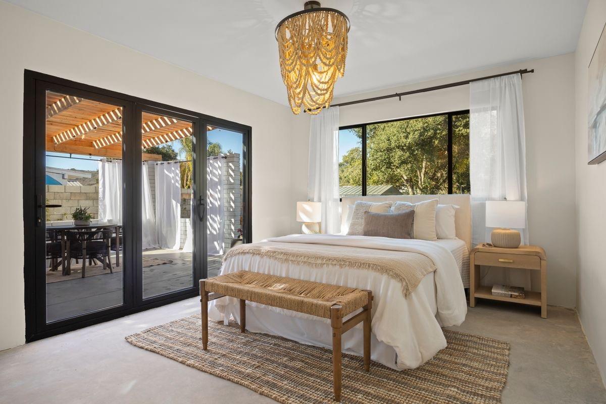 283 Burnham Road Oak View, CA 93022 - Photo 5 of 13 a bed sitting in a bedroom next to a window