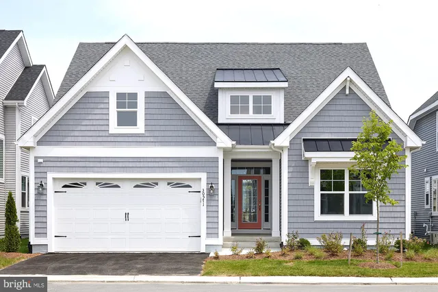 a view of a house with white walls