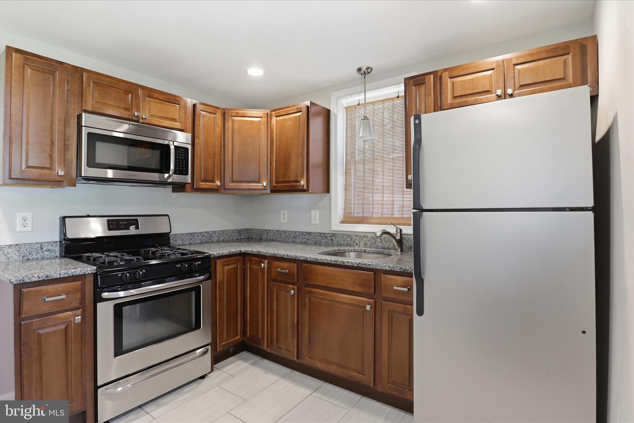 5242 Sands Road Lothian, MD 20711 - Photo 18 of 29 Modern Kitchen with stainless appliances