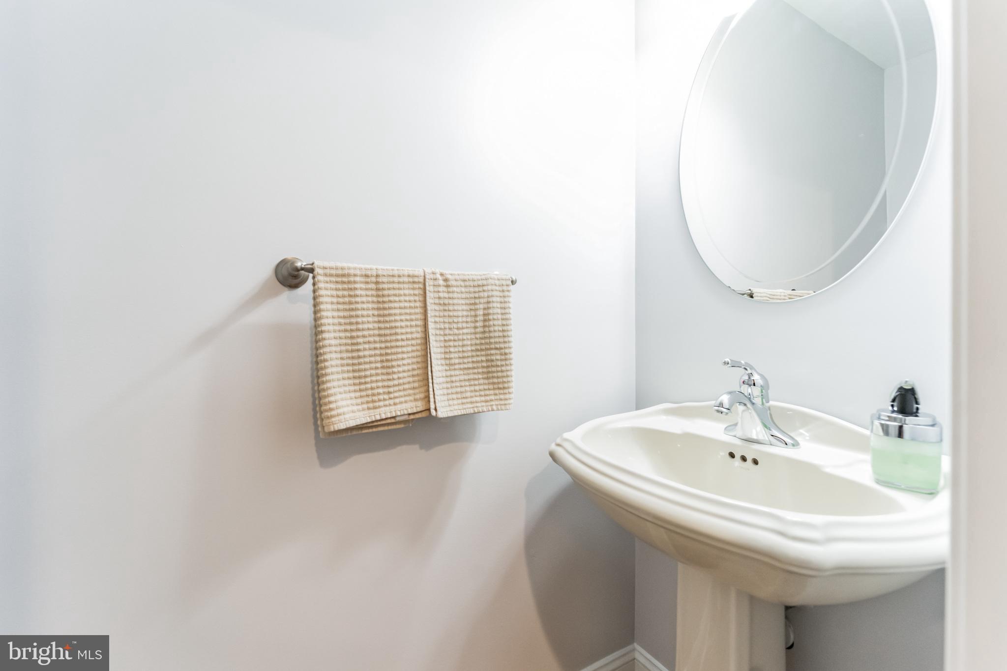 1012 B And L Club Road Pasadena, MD 21122 - Photo 12 of 54 First floor half bath