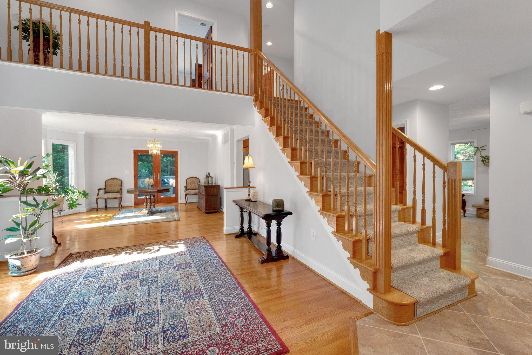1012 B And L Club Road Pasadena, MD 21122 - Photo 3 of 54 Entryway with vaulted ceilings + balcony overlook