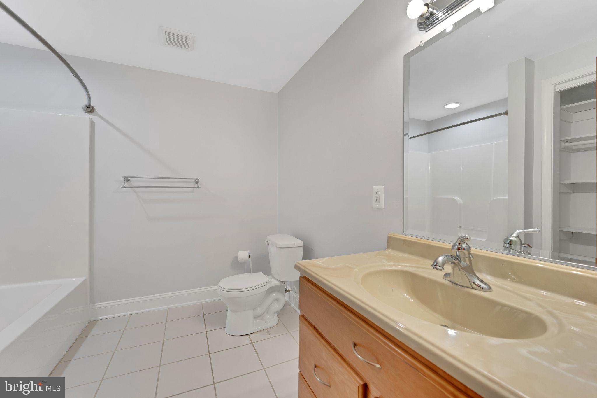 1012 B And L Club Road Pasadena, MD 21122 - Photo 38 of 54 Basement level full bathroom
