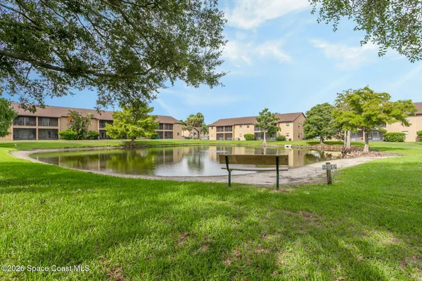 a garden view with a lake view