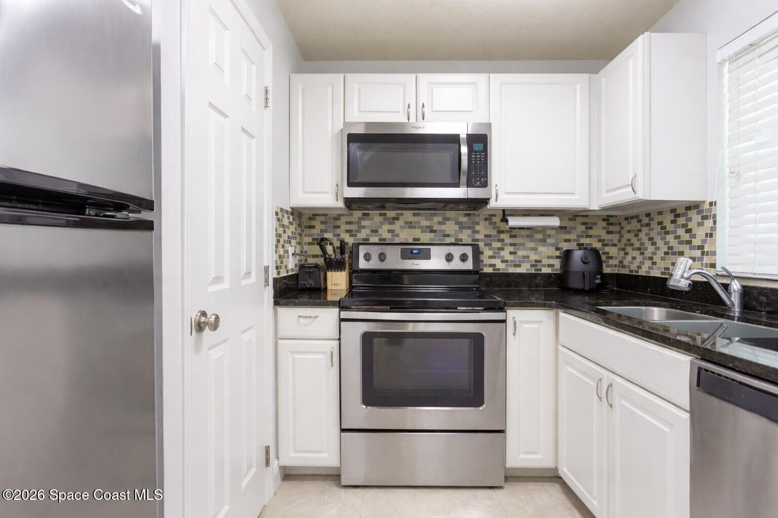 275 Spring Drive, Unit 7 Merritt Island, FL 32953 - Photo 3 of 18 Kitchen