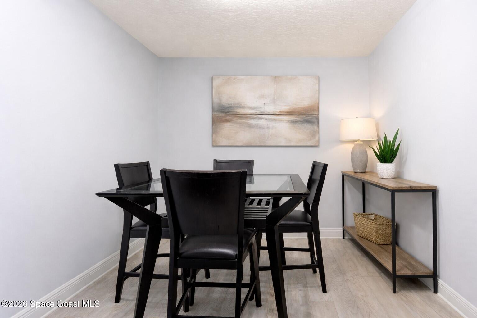 275 Spring Drive, Unit 7 Merritt Island, FL 32953 - Photo 4 of 18 Dining Staged