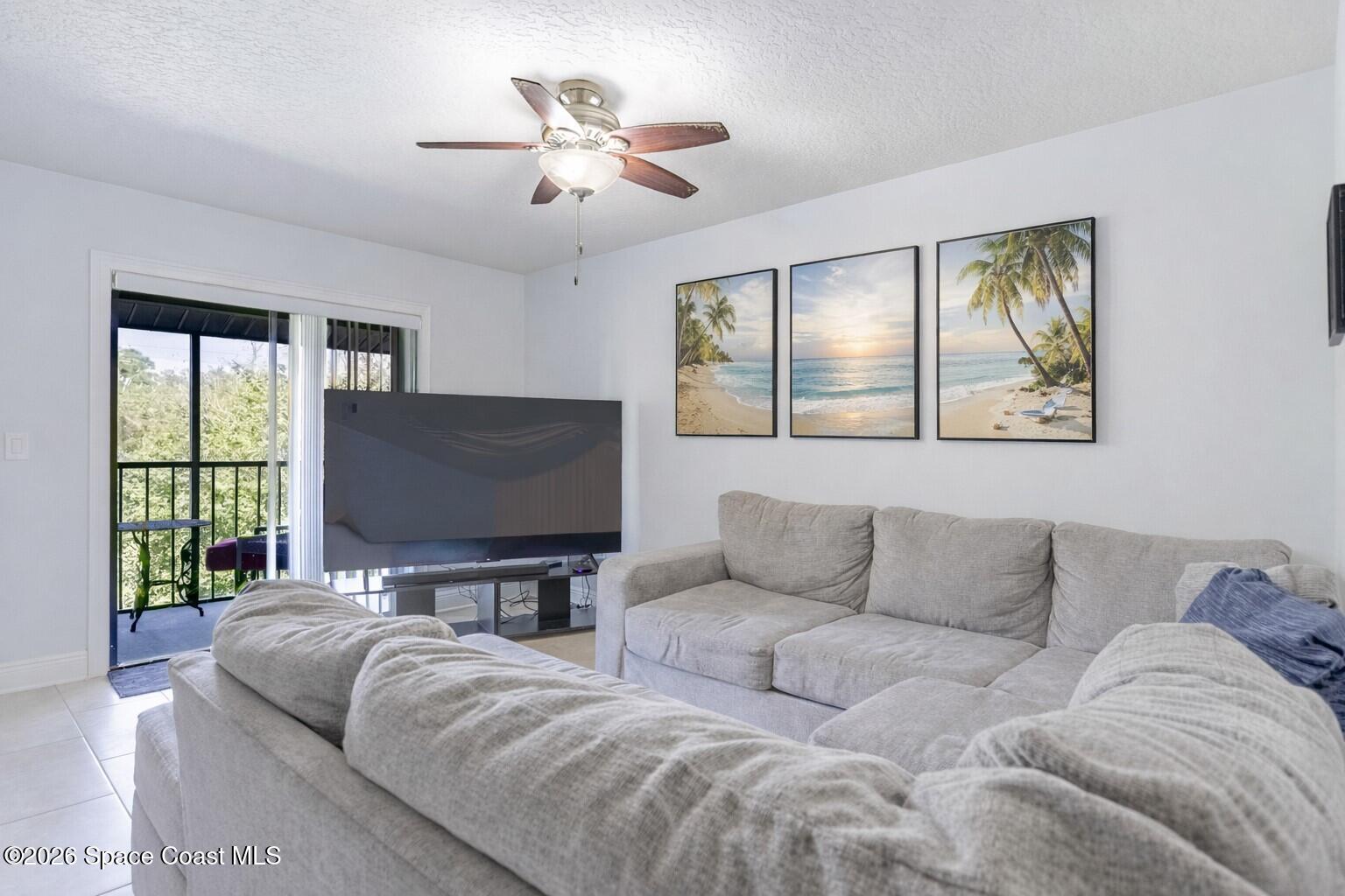 275 Spring Drive, Unit 7 Merritt Island, FL 32953 - Photo 5 of 18 Living Room Staged