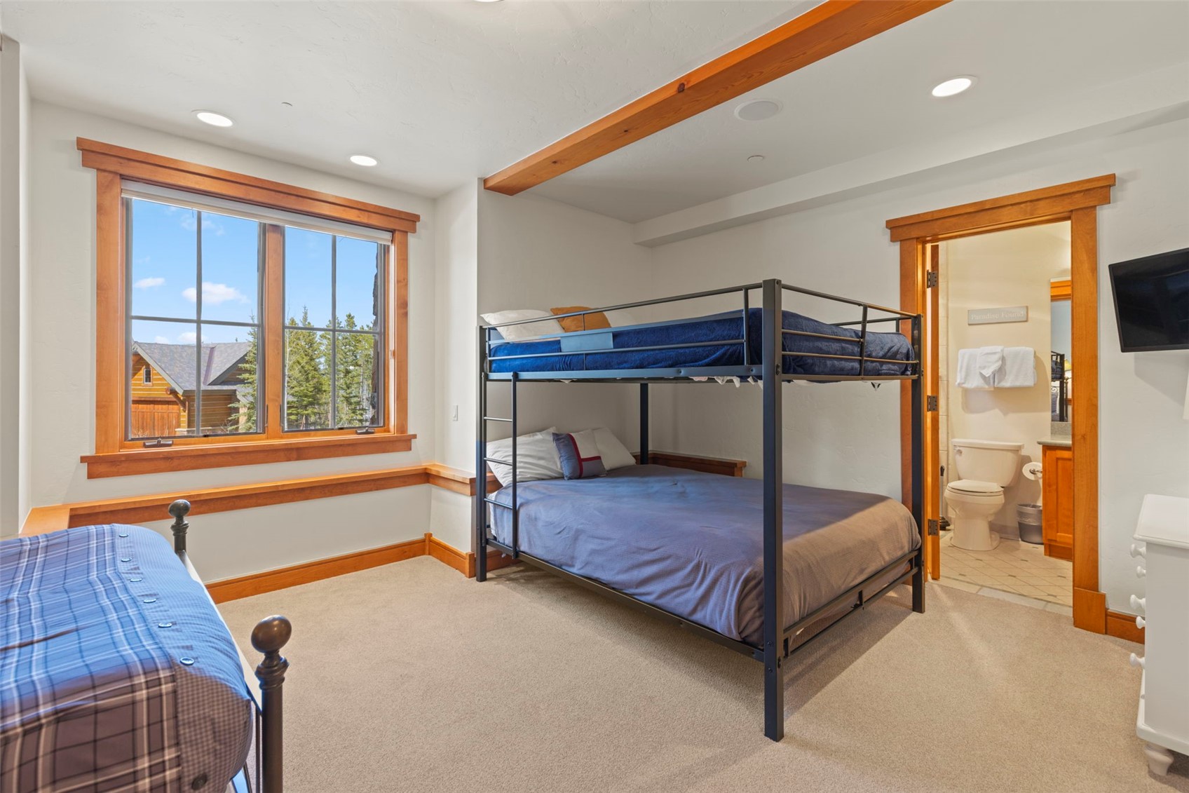317 Timbertrail Road Breckenridge, CO 80424 - Photo 42 of 50 a bedroom with a bed and a window
