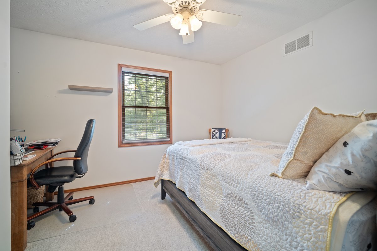 2606 Persimmon Place Bloomington, IL 61701 - Photo 11 of 19 a bedroom with a bed and a window