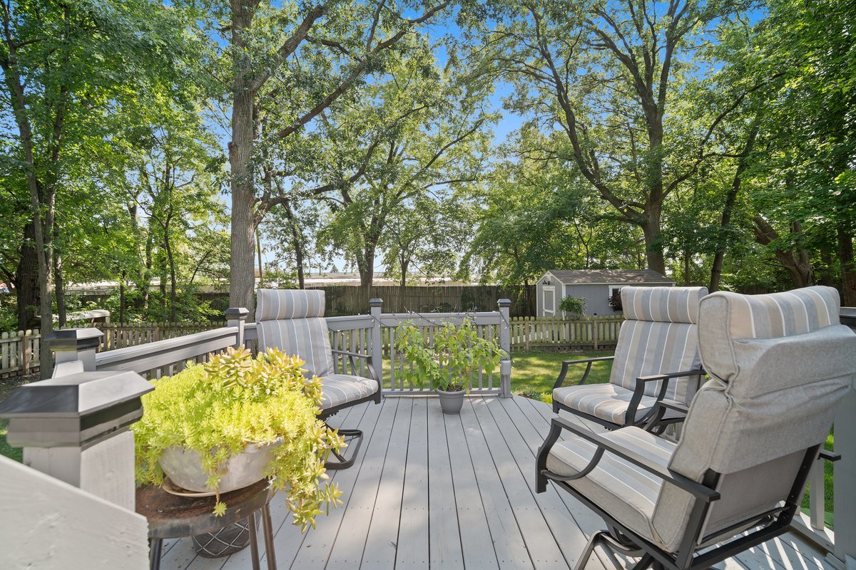 2606 Persimmon Place Bloomington, IL 61701 - Photo 17 of 19 a view of a couches in the deck under a large tree