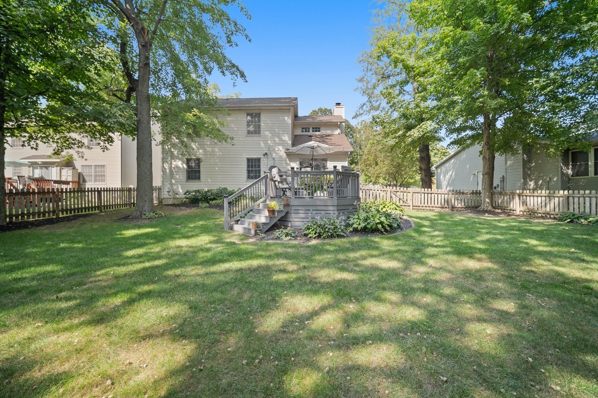 2606 Persimmon Place Bloomington, IL 61701 - Photo 18 of 19 a view of a backyard with a garden