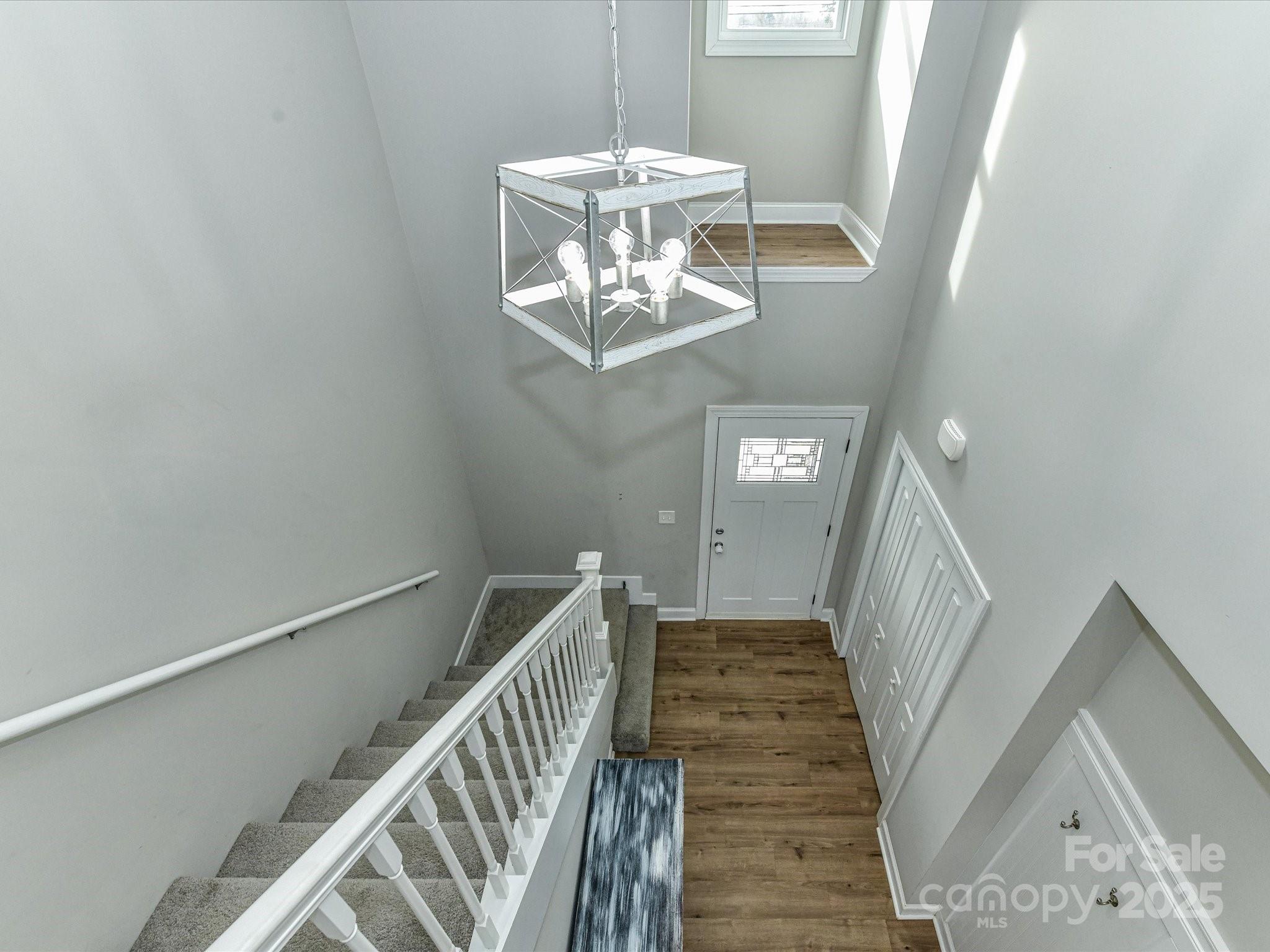899 Hasty Road Marshville, NC 28103 - Photo 31 of 44 a view of entryway and hall with wooden floor