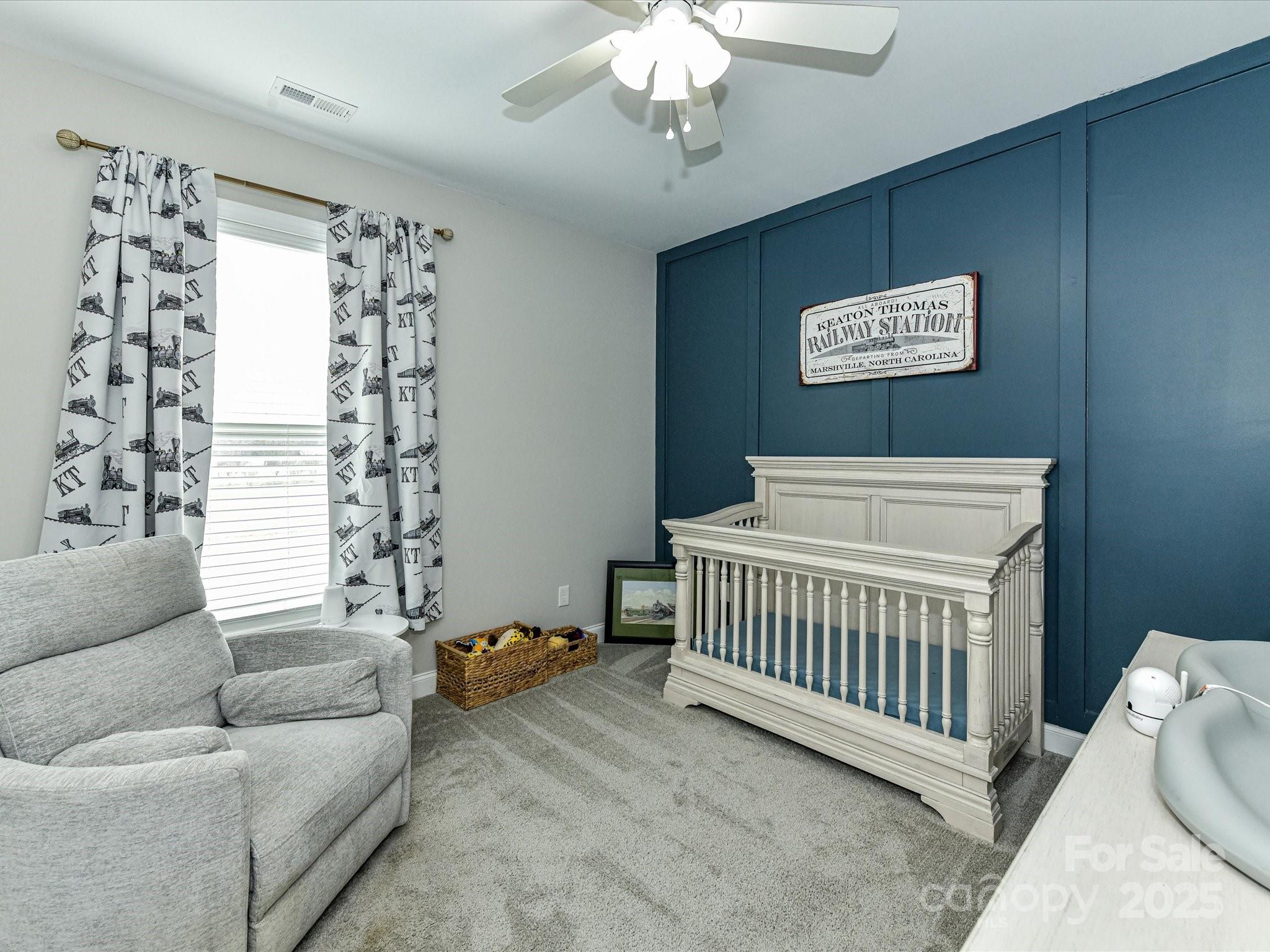 899 Hasty Road Marshville, NC 28103 - Photo 35 of 44 a bedroom with furniture and a window