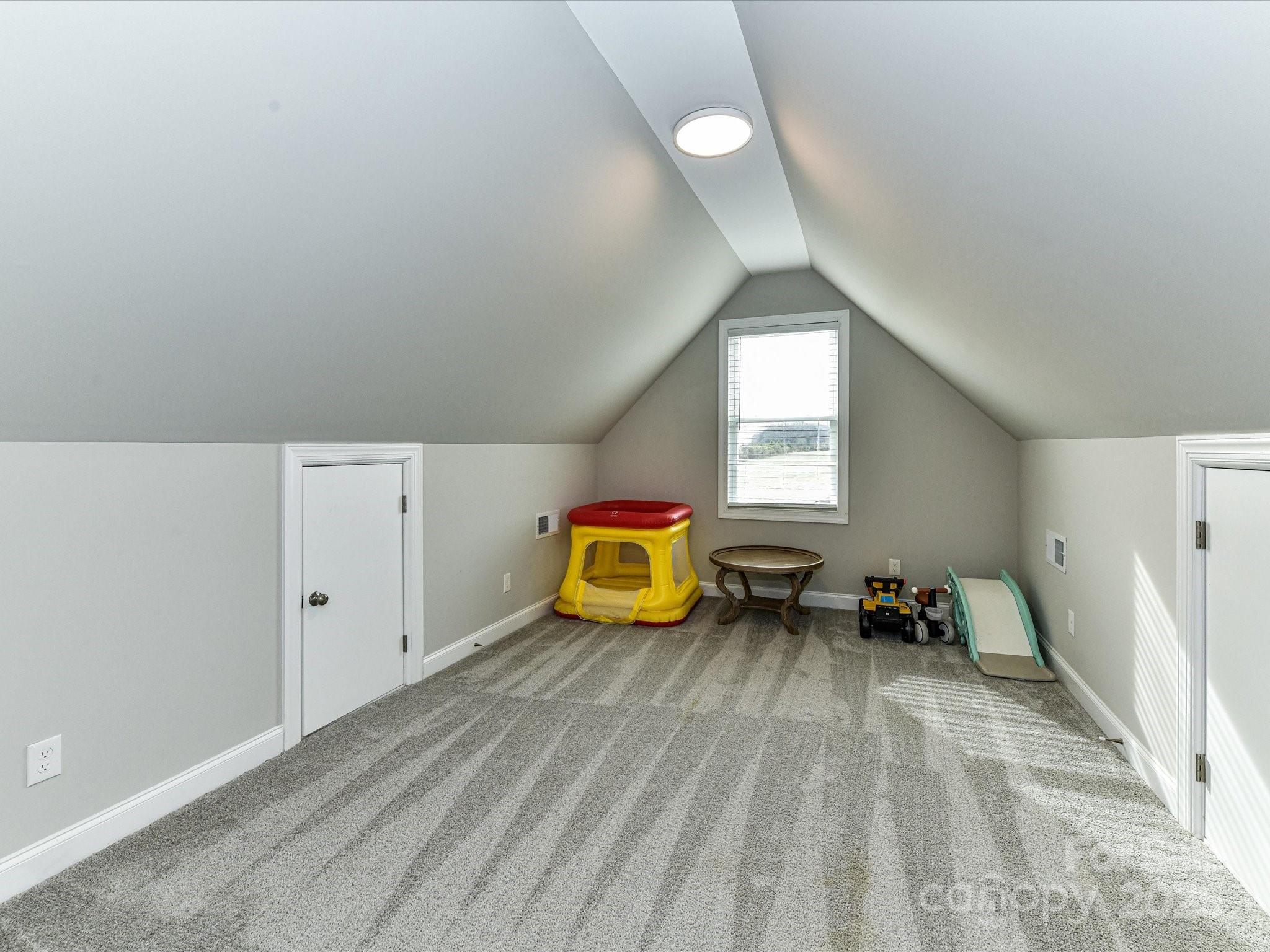 899 Hasty Road Marshville, NC 28103 - Photo 37 of 44 a bedroom with window and a table
