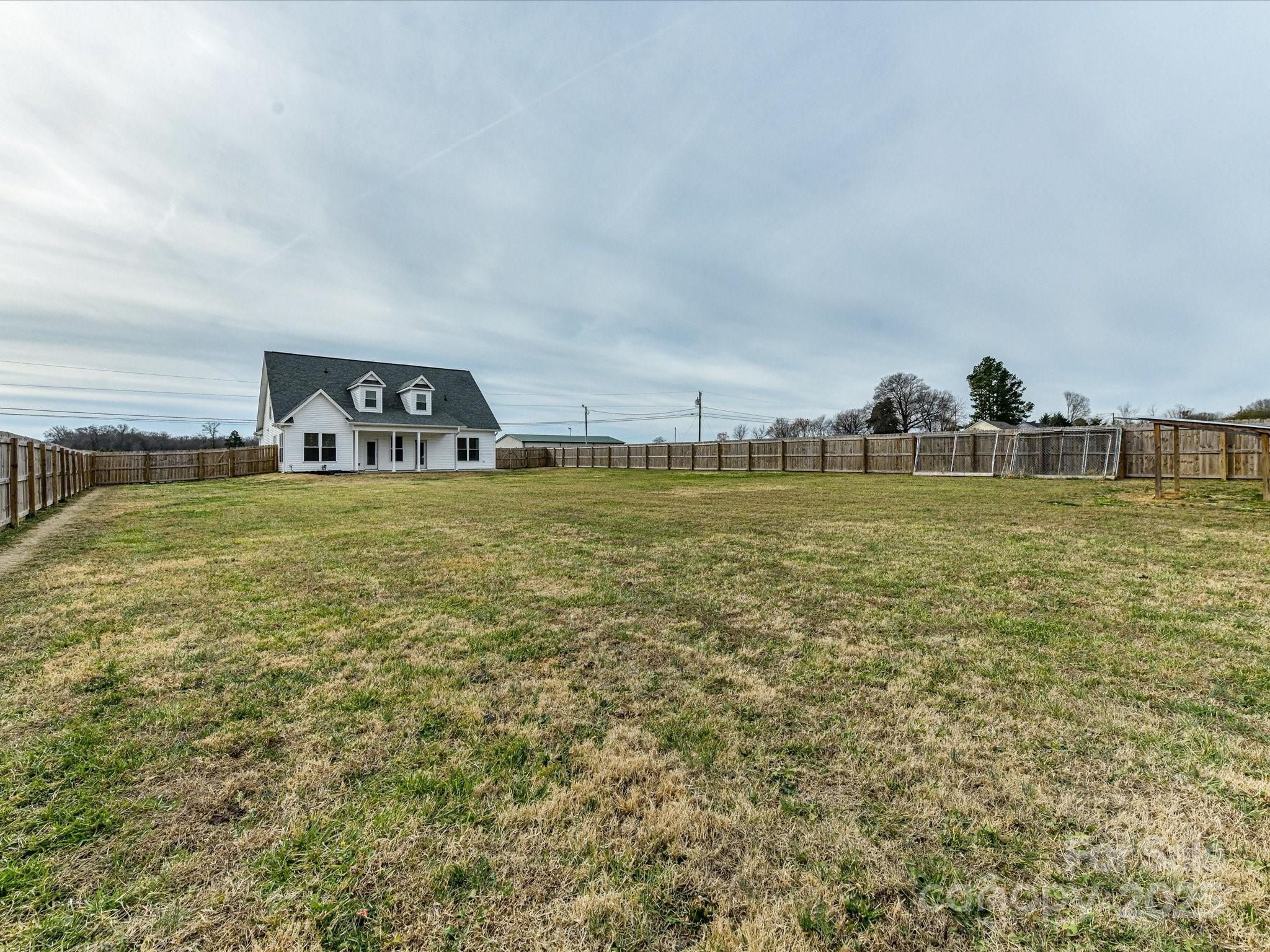 899 Hasty Road Marshville, NC 28103 - Photo 43 of 44 a view of a ocean with a big yard