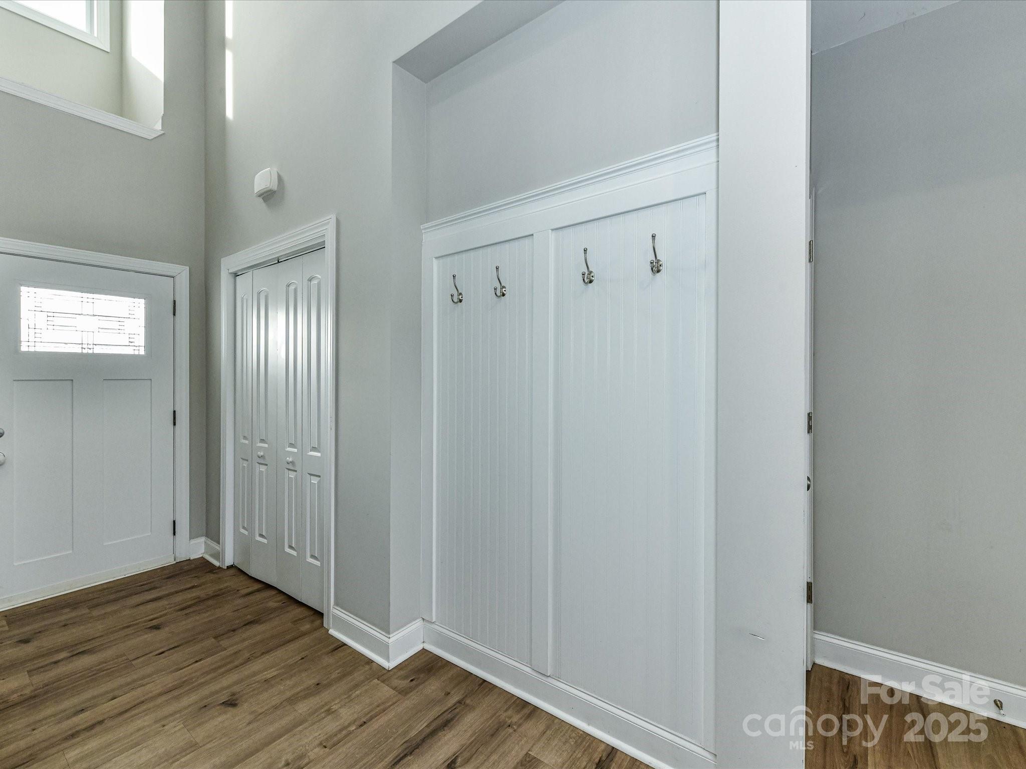 899 Hasty Road Marshville, NC 28103 - Photo 8 of 44 a view of a hallway with wooden floor