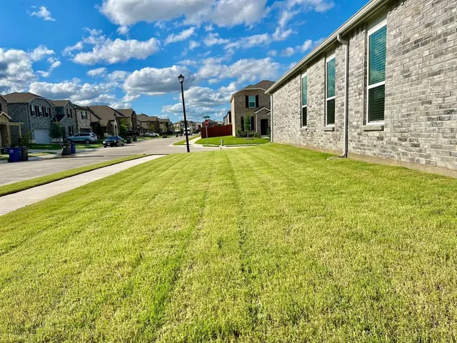 a view of a patio with swimming pool