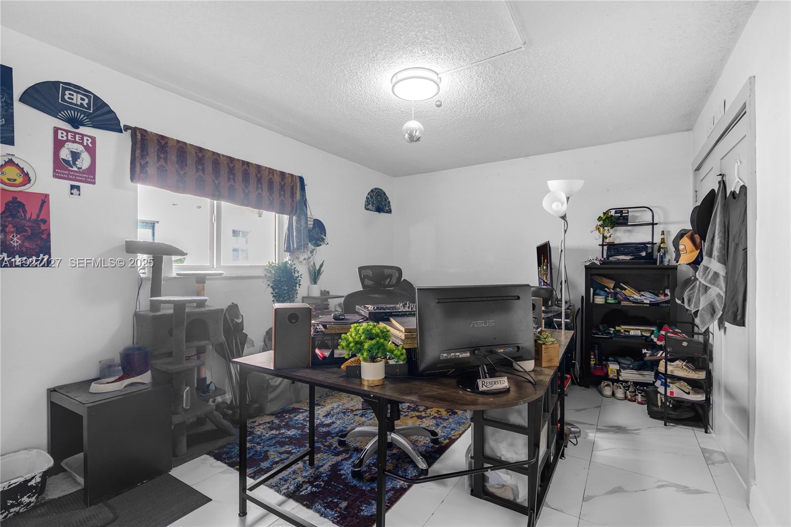 3601 Southwest 2nd Street, Unit 3601 Miami, FL 33135 - Photo 13 of 21 a view of a workspace with furniture