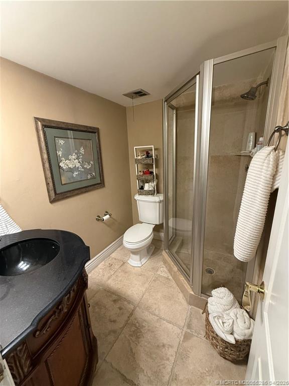1950 Southwest Palm City Road, Unit 3306 Stuart, FL 34994 - Photo 35 of 49 a view of a bathroom with a toilet