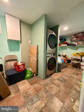 a bedroom with a bed and a mirror