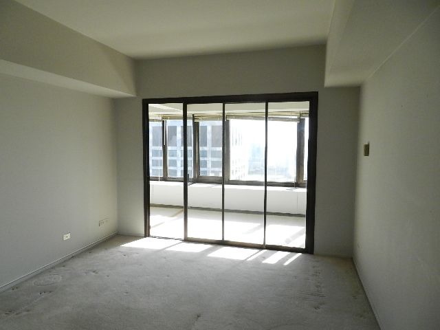 175 East Delaware Place, Unit 7109 Chicago, IL 60611 - Photo 6 of 14 an empty room with windows and view of an empty room