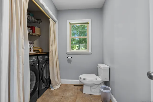 a bathroom with a toilet