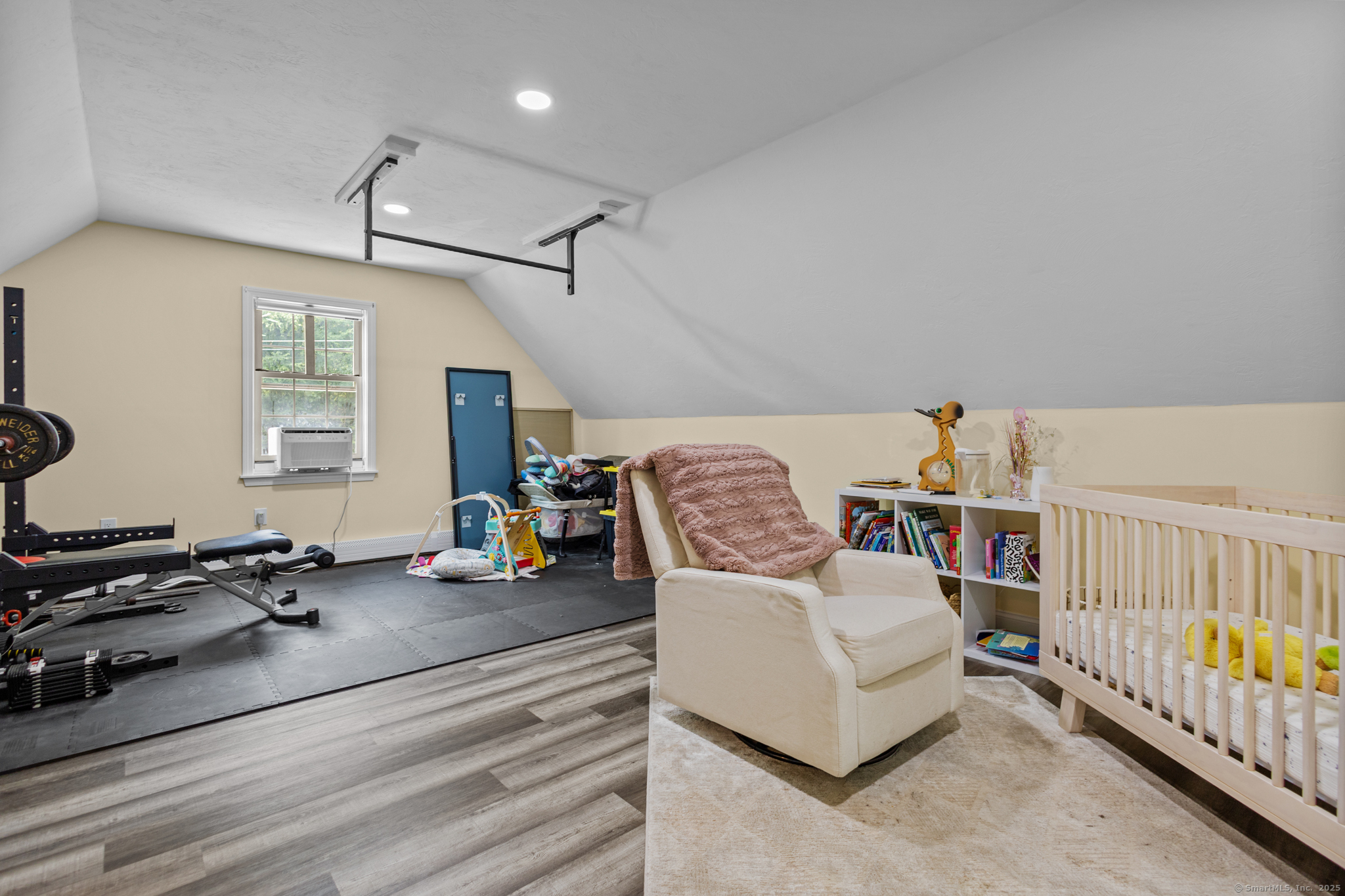 433 Fabyan Road Thompson, CT 06255 - Photo 19 of 39 a bedroom with furniture and a window