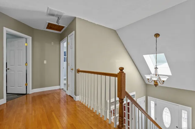 a view of a hallway view with staircase